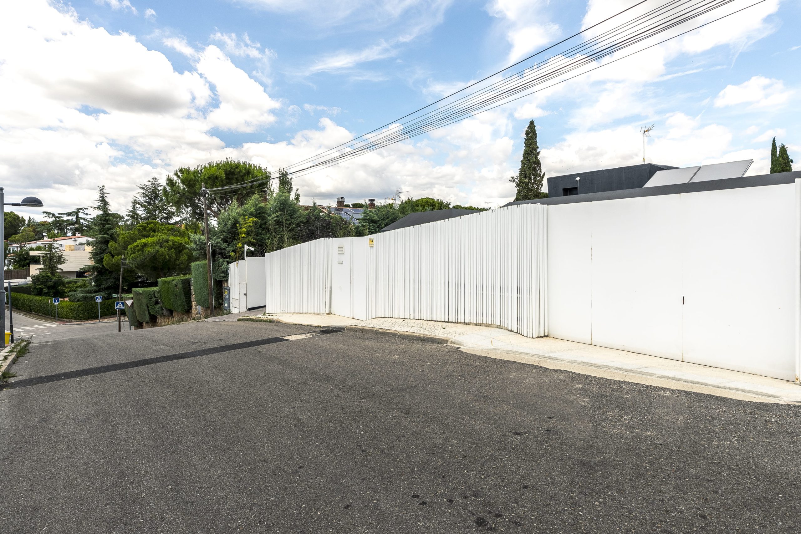 Stunning images of a contemporary chalet featuring 6 bedrooms, an infinity pool, and a beautifully landscaped garden, designed for luxury living and energy efficiency.